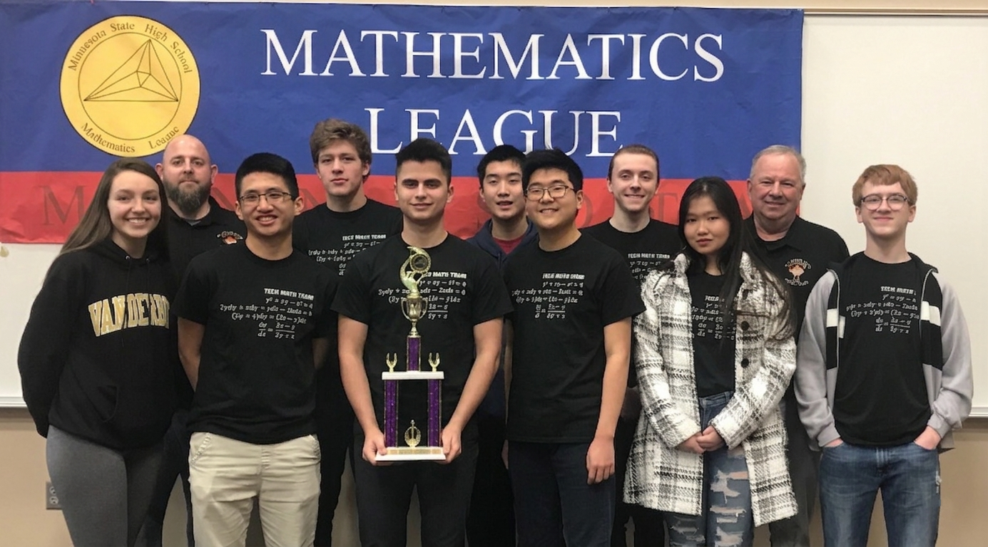 High school math team with state tournament trophy